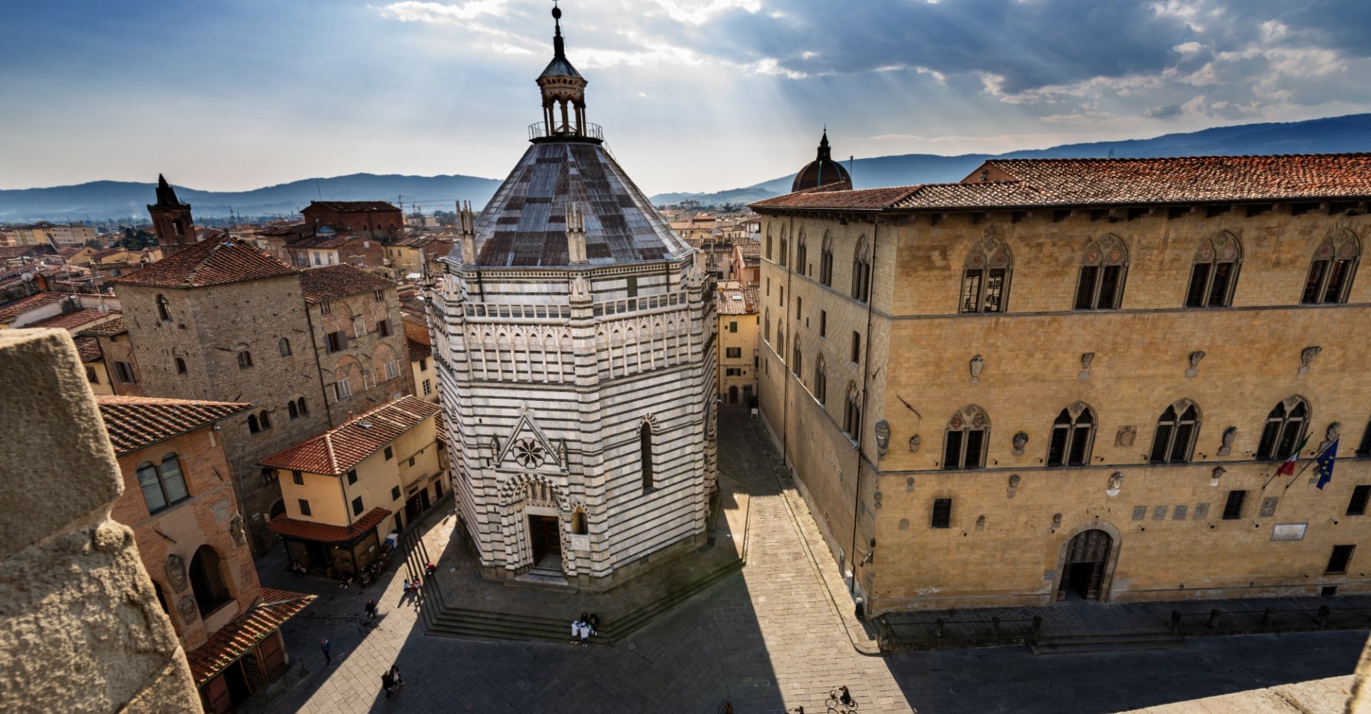 The Battistero di San Giovanni (Baptistery of St. John) in the court from the bell tower of the Cathedral of San Zeno