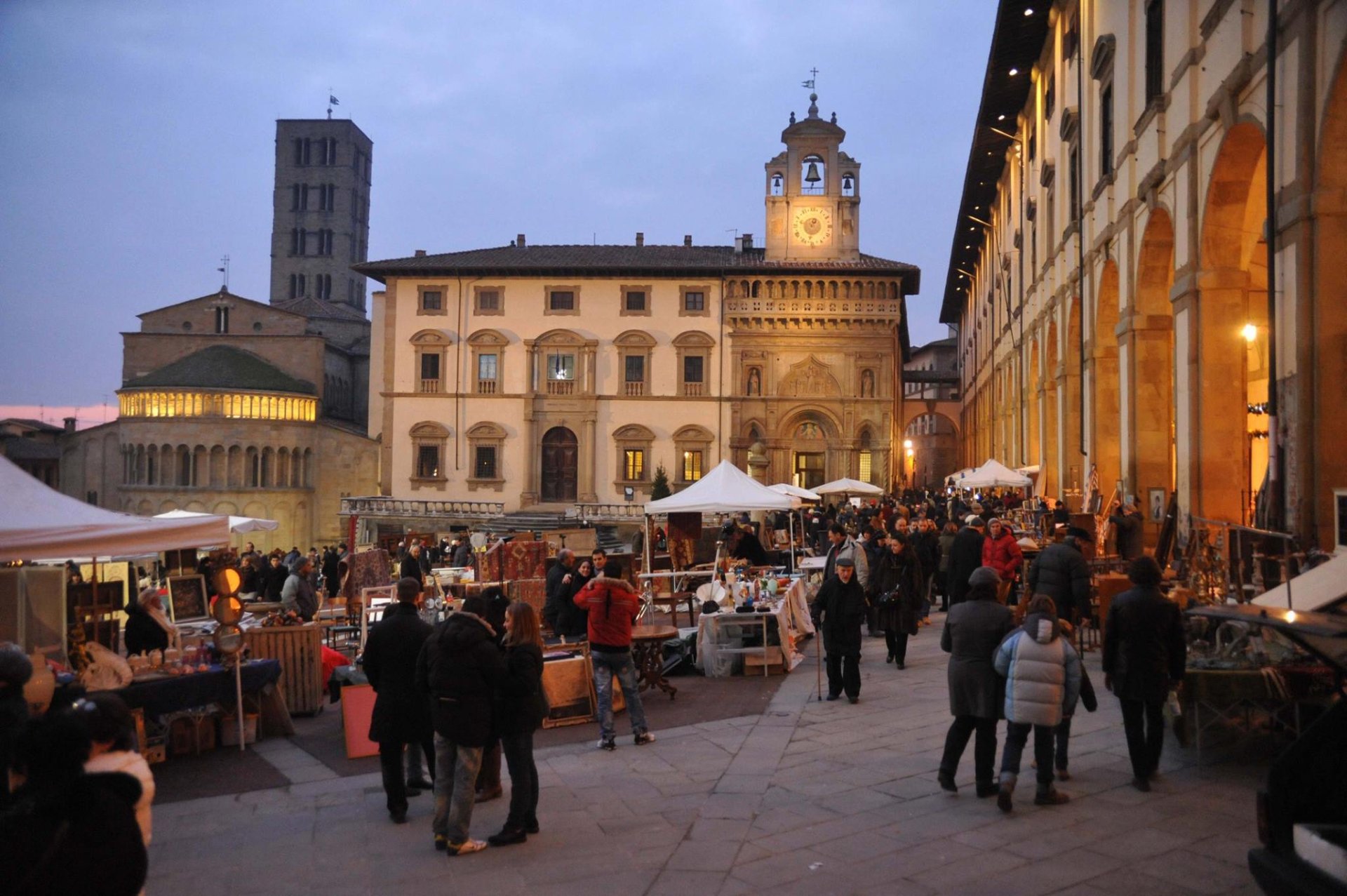 Antiques market by the Palazzo Comunale in Arezzo, Italy